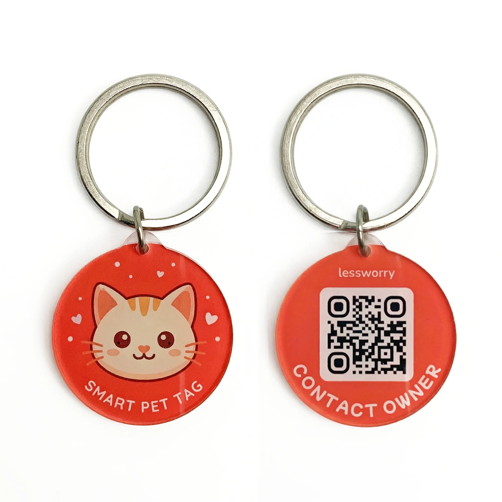 Red circular pet ID tags with a cute ginger kitten face on one side and a QR code with contact information on the other, attached to silver key rings.